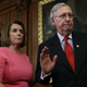 Illustration for article titled Pelosi and McConnell Got Graffito Tagged